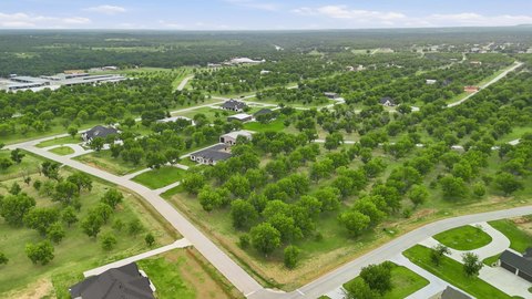 Gated Corner Residential Lot in Pecan Plantation