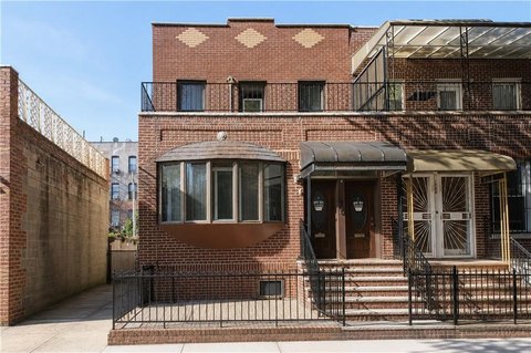 Brick Duplex With Garage