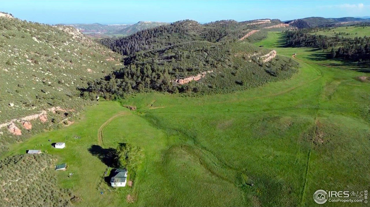 Secluded 40-Acre Retreat Bordering Wilderness