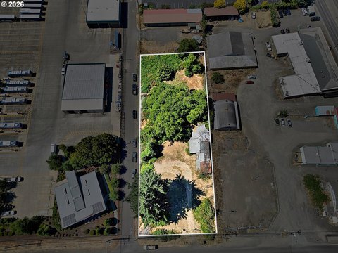 Level Commercial Land with Existing House
