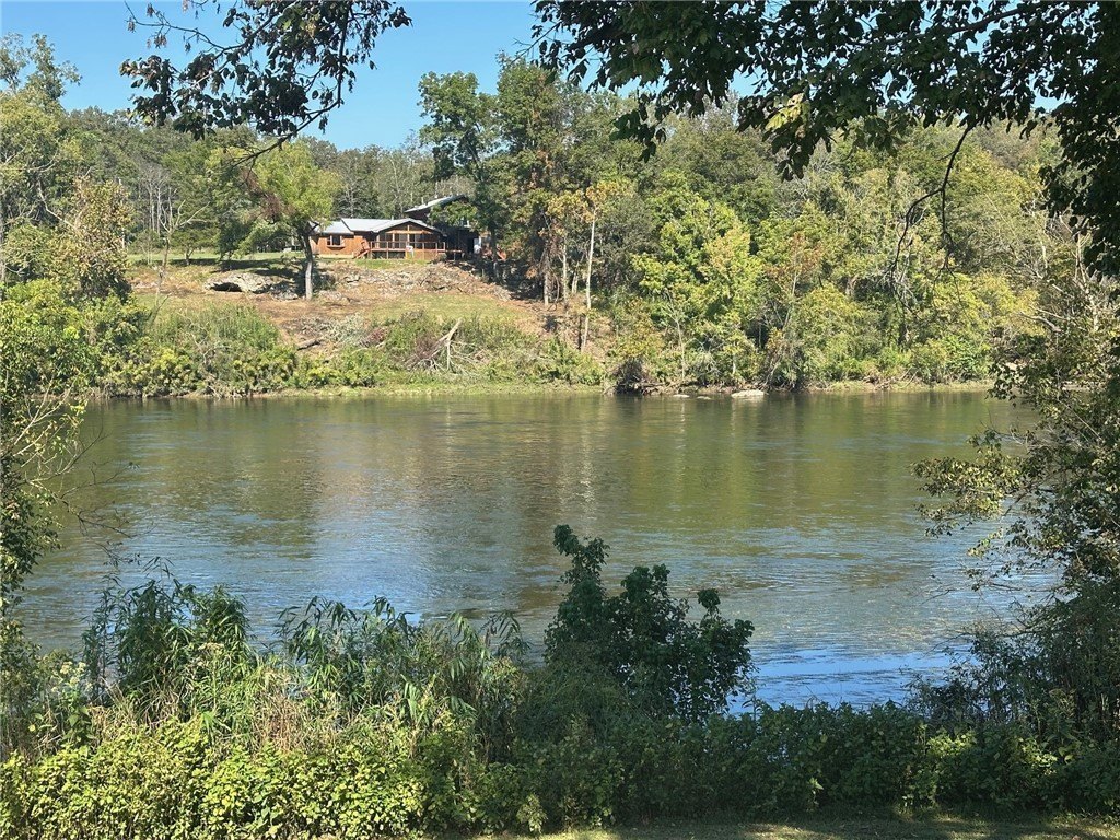 Wooded Land with River Frontage