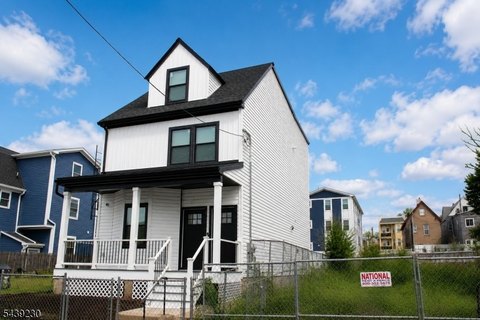 Fully Renovated Two-Family Residence