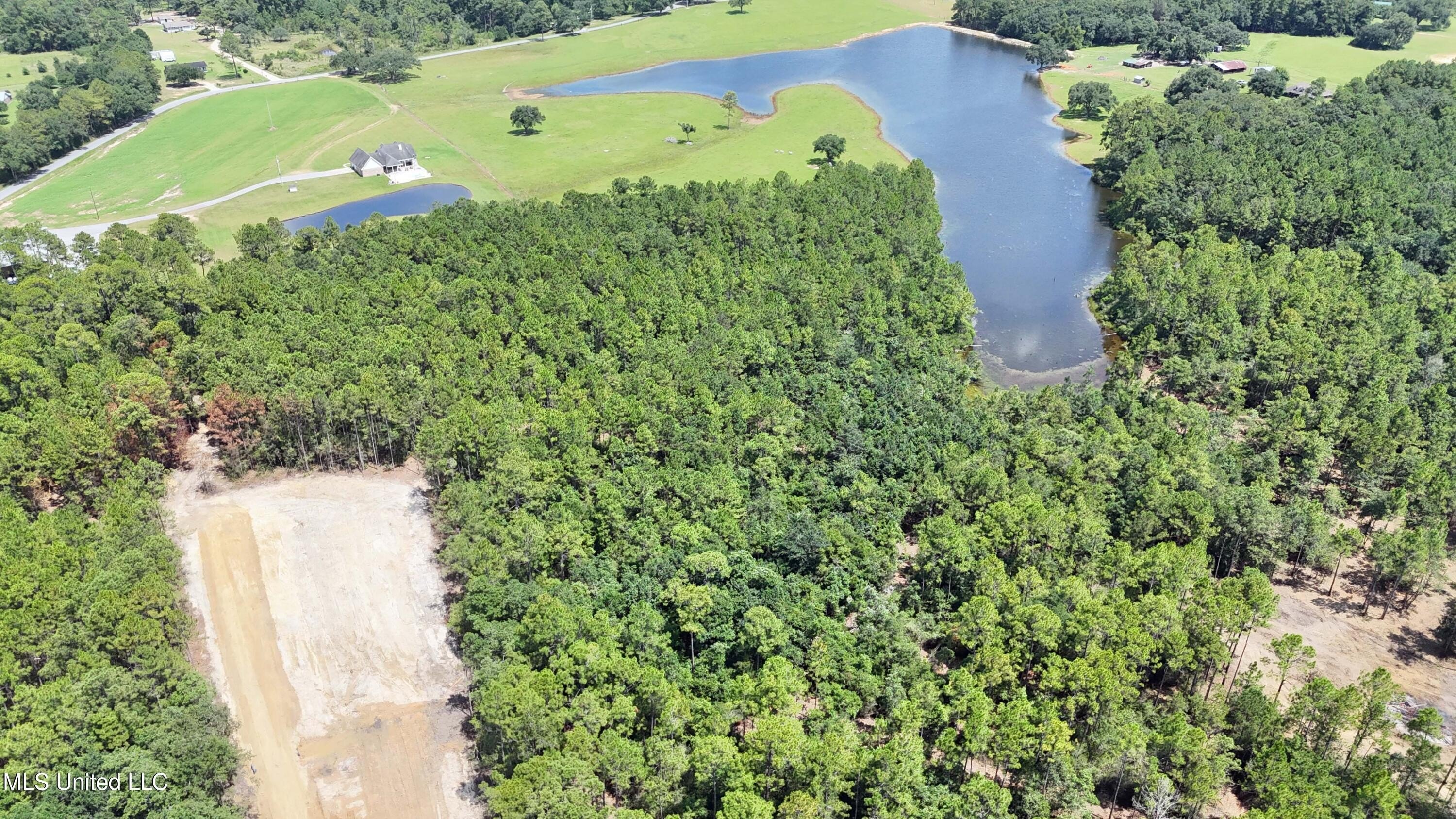 8 Acres Overlooking 12-Acre Lake