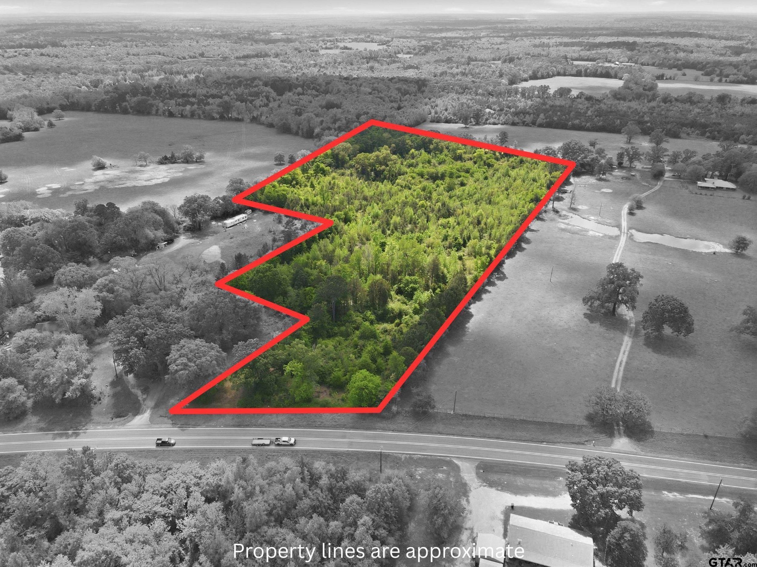 Highway Frontage Acreage with Pond