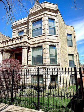 Three-Unit Stone Building with Garage
