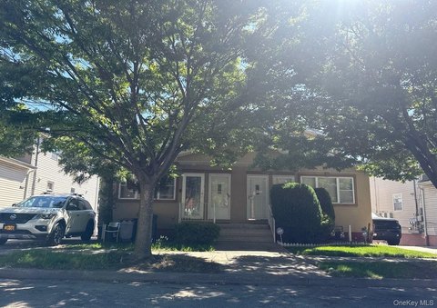 Springfield Gardens Colonial Multi-Family Home