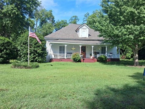 Updated Farmhouse on Half-Acre Lot