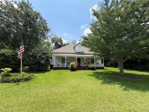 Updated Farmhouse on Half-Acre Lot