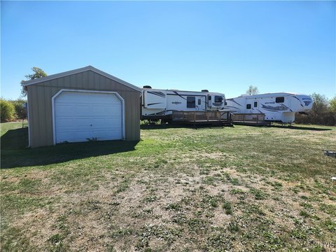 Waterfront Land with Storage Building