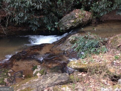 Land with Creek and Mountain Views