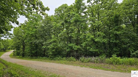 Wooded Rolling Homesite in Gated Community