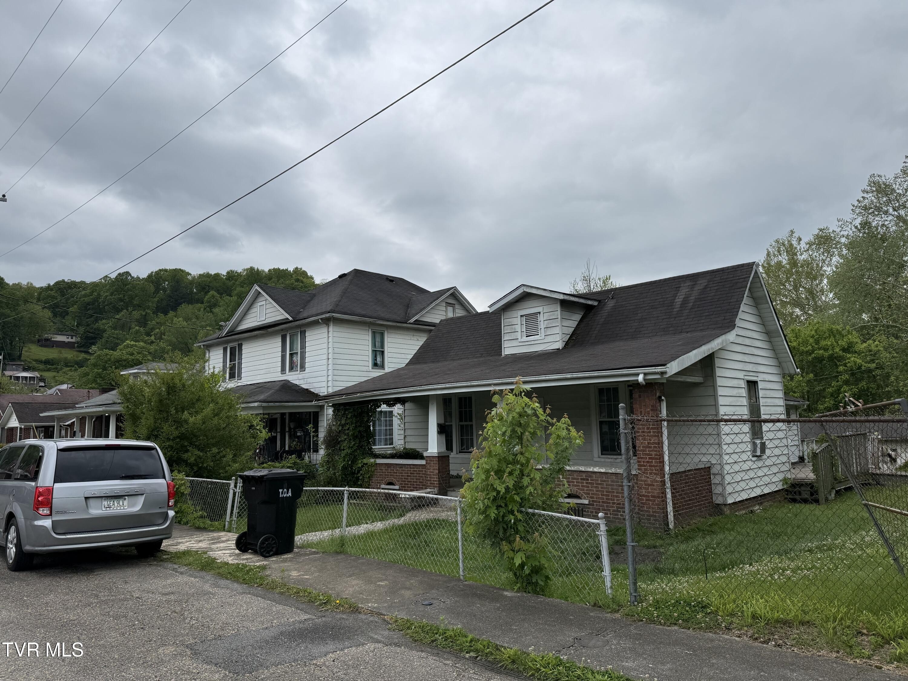 Income-Producing Triplex Plus Home Package
