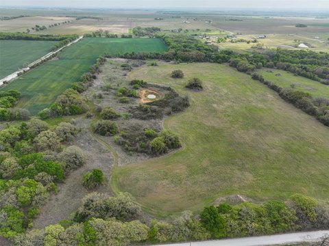 Versatile Acreage with Dual Road Access