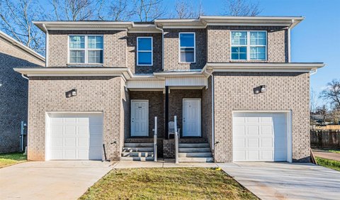 Brick Duplex with Attached Garages