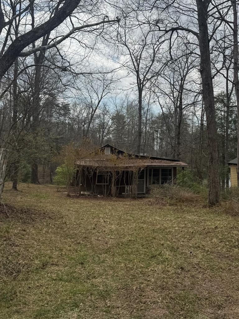 Lakefront Land with Renovation Potential
