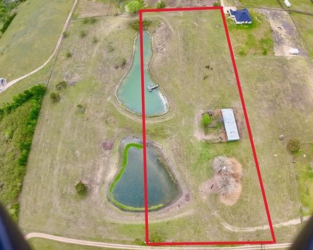 Fenced Waterfront Acreage with Ponds