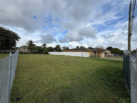 Fenced Waterfront Residential Lot