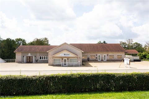 Mixed-Use Property with Garage Bays
