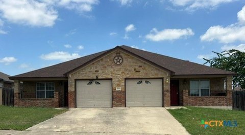 Ranch Duplex with Fenced Backyard