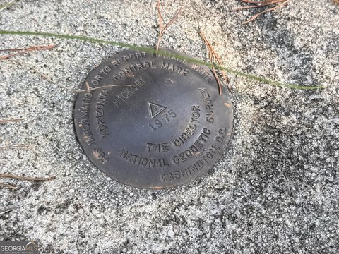 Land with Mountain Top Views