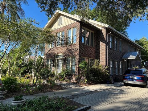 Two-Story Brick Duplex with Separate Entrances