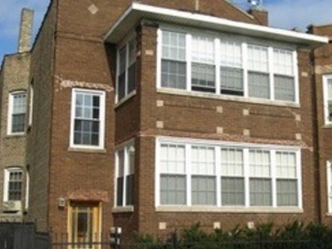 Brick Three-Unit Multifamily Property