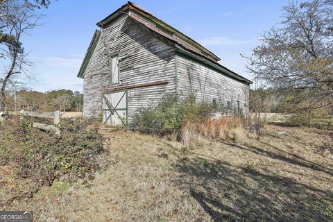 Fayetteville Acreage with Development Potential