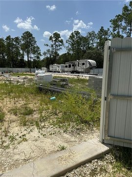 Fenced Lot with RVs