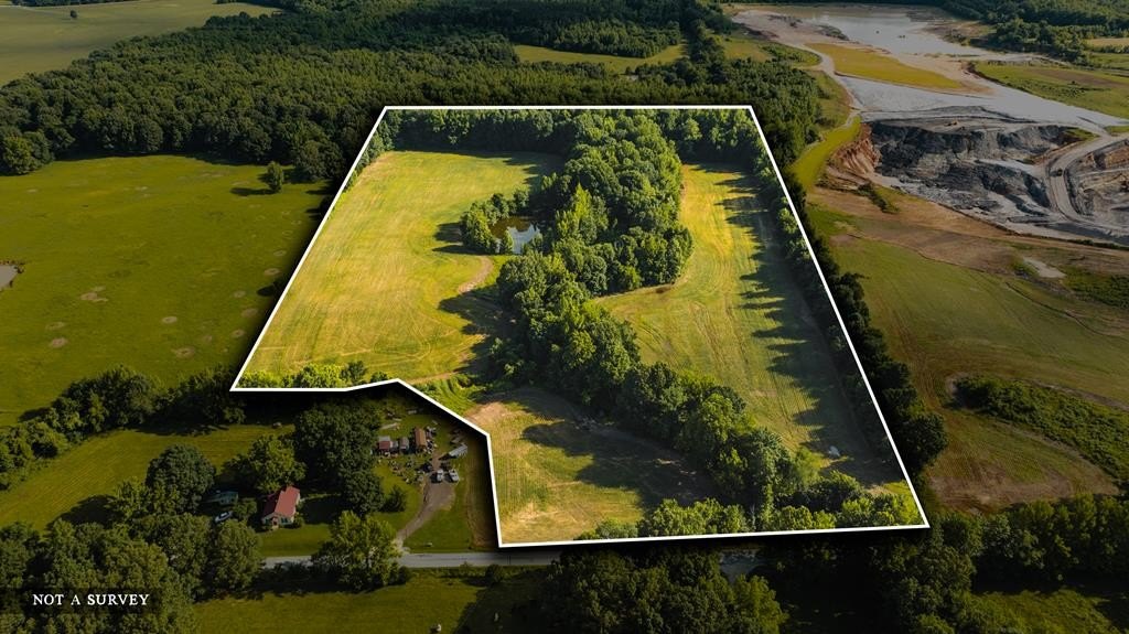 24.47 Acres with Pond