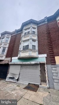 Mixed-Use Triplex with Storefront