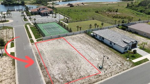 Gated Waterfront Corner Homesite Land