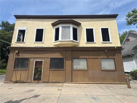 Gutted Mixed-Use Fourplex