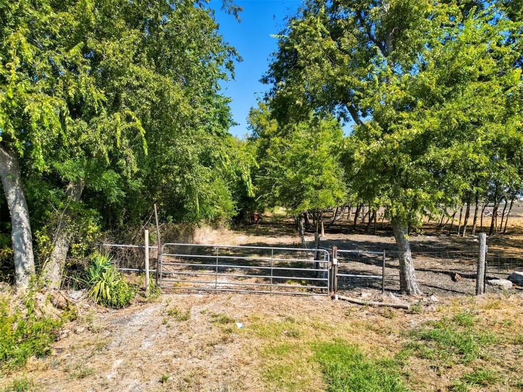 Heavily Wooded Land with Creek