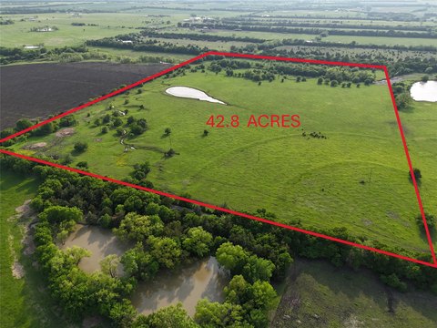 Fenced Ranchland with Stock Tank