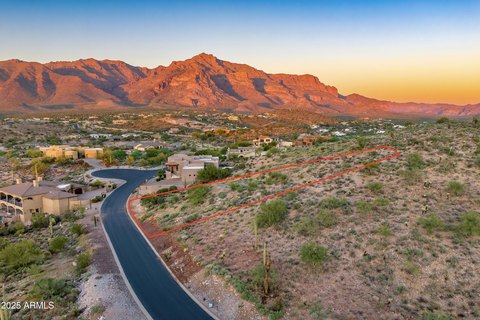Land with Mountain and City Views