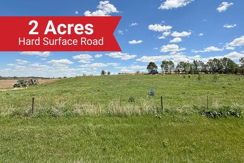Two Acre Fenced Vacant Land