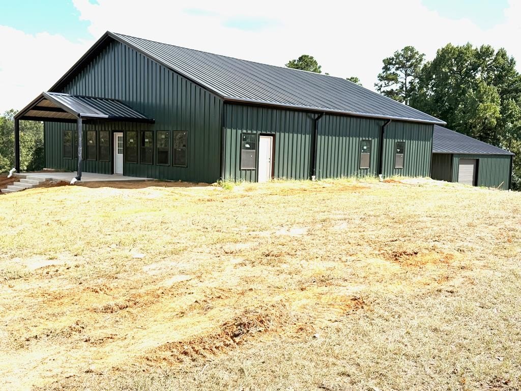 Land with Partially Completed Home