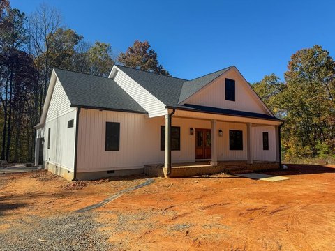 Modern Farmhouse on Wooded Acres