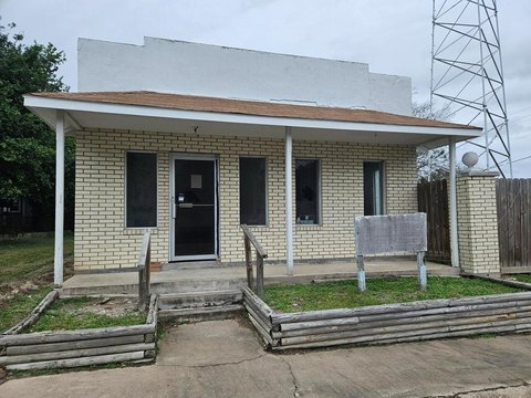 Corner Lot Cinder Block Building