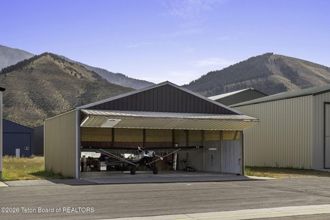 Heated Aviation Hangar with Bifold Door