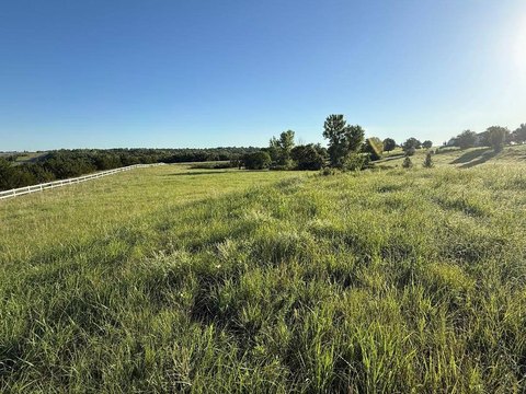 Rolling Land with Fishing Pond Views