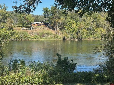 5-Acre Wooded Retreat with River Frontage