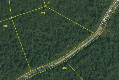 Wooded Land with Mountain Views