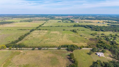 Flat Cleared Farmland with Pond