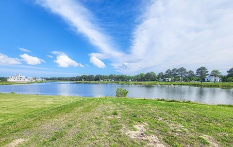 Land with Lake and Town Views