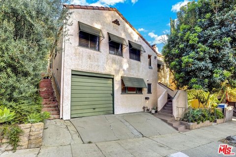 Spanish-Style Duplex with Garden