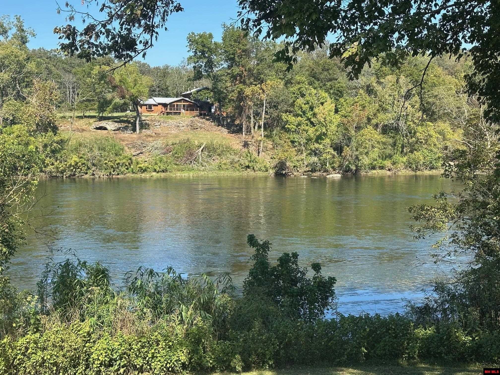 Wooded Land with River Frontage