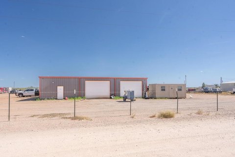 Fenced Warehouse Shop with Acreage