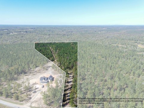 Secluded Acreage with Flowing Creek