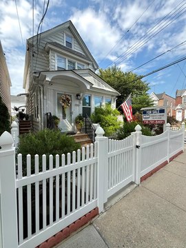 Corner-Lot Duplex With Garage